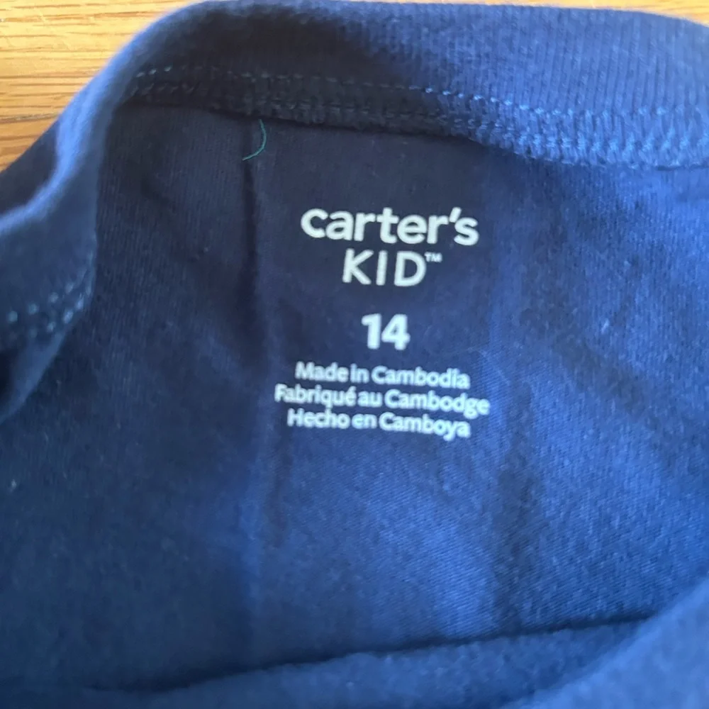 Matching Carters size 8 and a 14.  Vacation shirts for siblings!